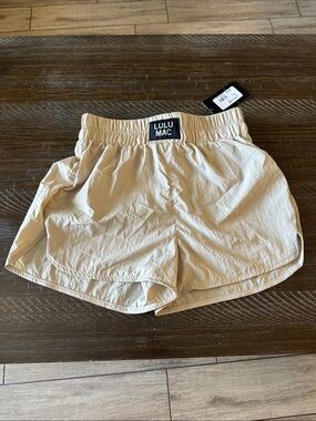 Lulu Mac athletica cream athletic shorts with elastic waist
